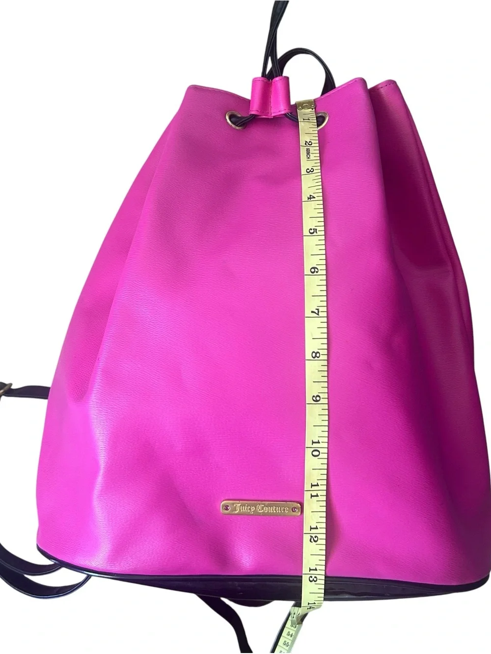 Juicy Couture Vibrant Pink Drawstring Backpack with Gold Accents